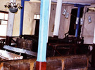 Wooden pews and banners in Bershad synagogue, 2004 (courtesy of I.P. Weisz)
